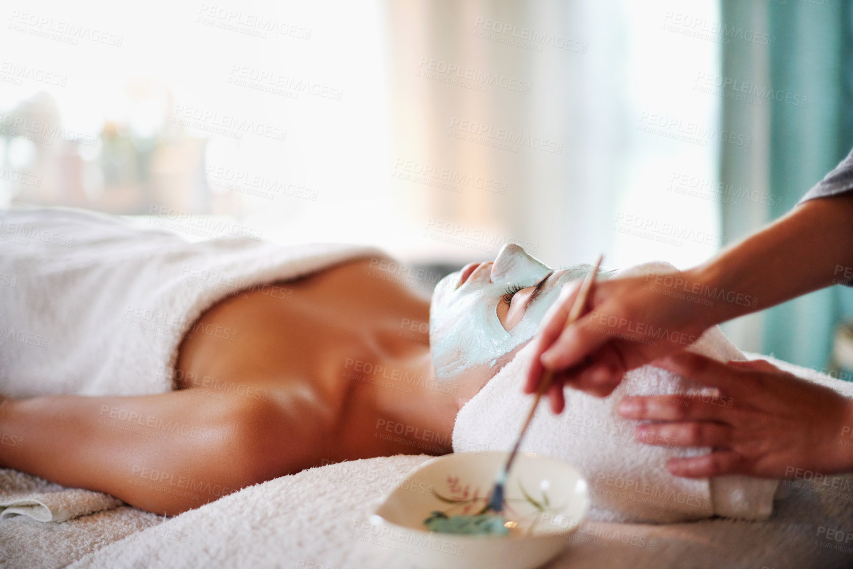 Buy stock photo Skincare, facial and woman with clay mask in spa for beauty treatment, wellness and healthy skin. Dermatology, luxury salon and person with beautician for anti aging detox, cosmetics and cleanse