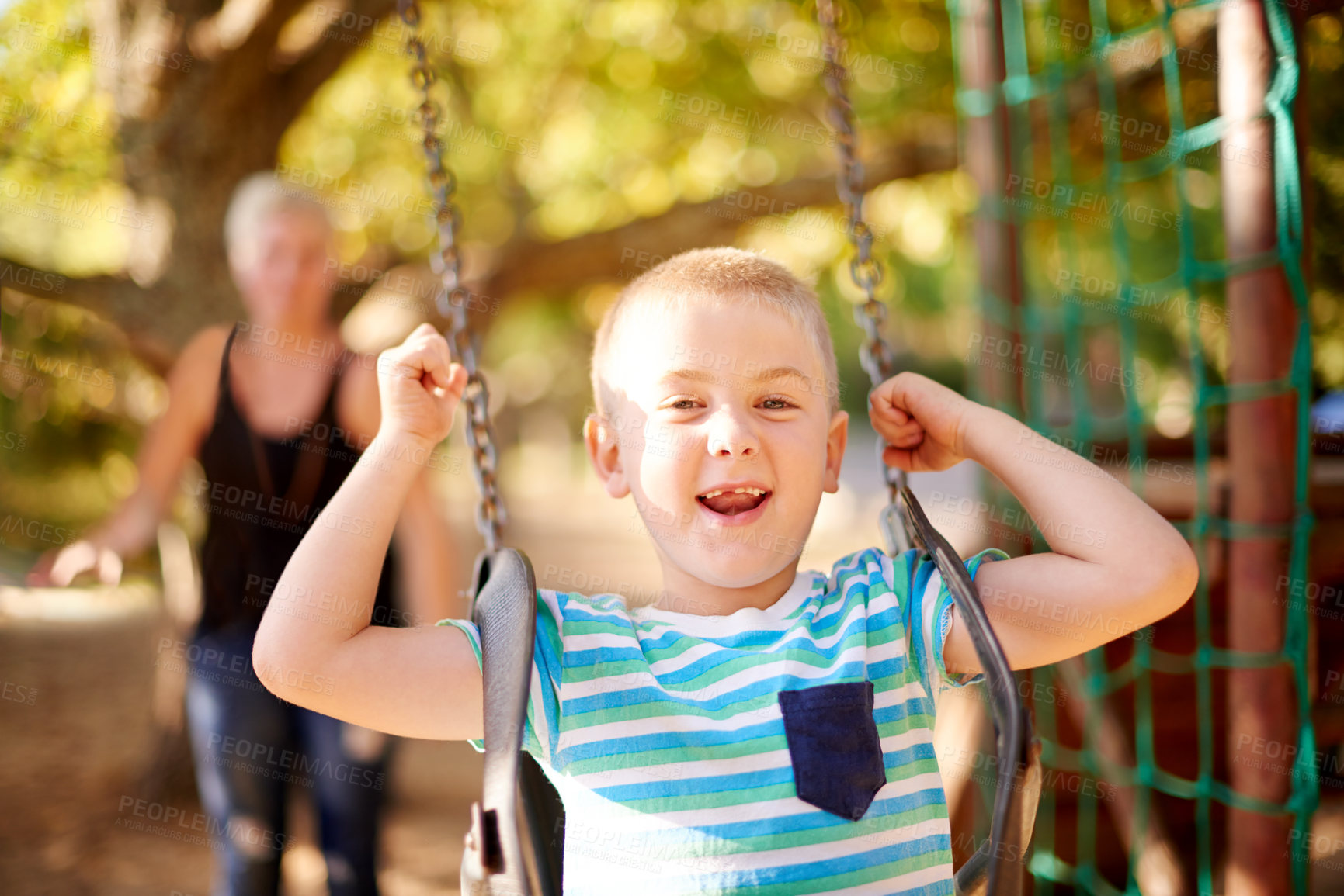 Buy stock photo Swing, push and portrait of boy with mom, outdoor adventure and development for kids in park. Play, mother and happy child in playground for growth, fun games or childhood bonding on summer weekend