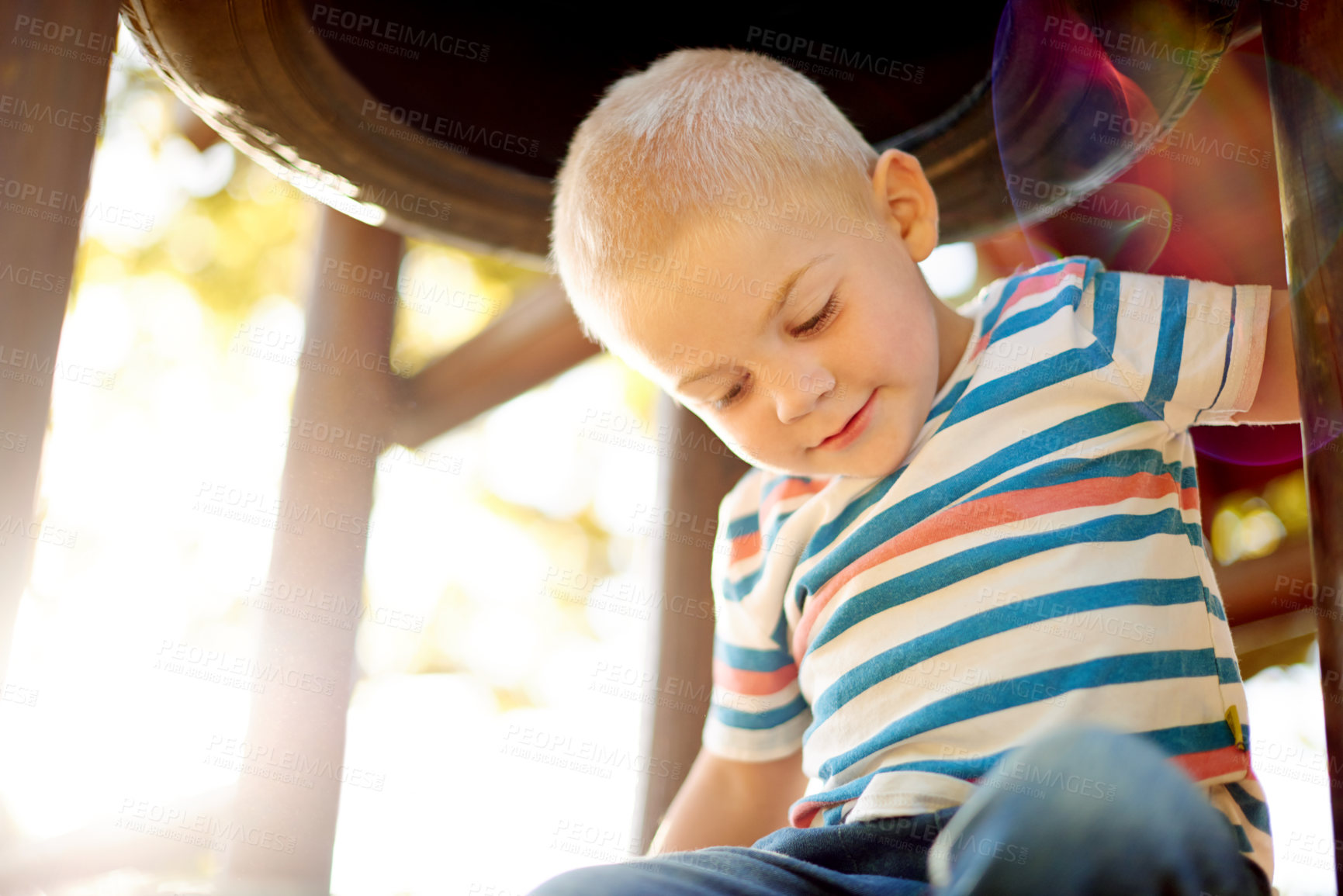 Buy stock photo Development, growth and boy child on jungle gym, having fun in nature for activity, games or play. Coordination, motor skills and happy kid with curiosity outdoor at playground in park with flare