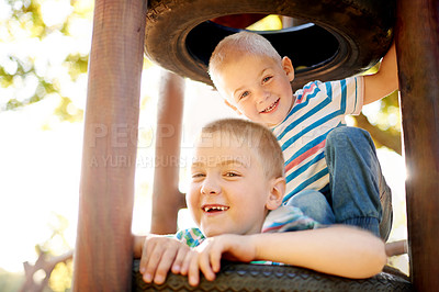 Buy stock photo Climbing, development and portrait of kids at playground, having fun in nature for activity, games or play. Coordination, motor skills and smile of happy child with brother at jungle gym in park