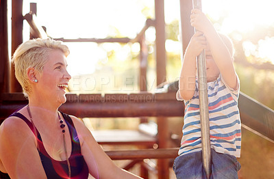 Buy stock photo Happy, playground slide and mom with child in park for playing, childhood and adventure outdoors. Nature, family and mother with young boy for bonding, learning skills and development on jungle gym