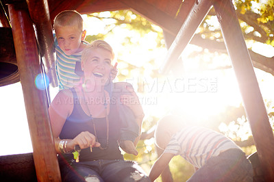 Buy stock photo Happy, playground and mom with kids in park for playing games, childhood and adventure outdoors. Sunlight, family and mother with children for bonding, learning skills and development on jungle gym