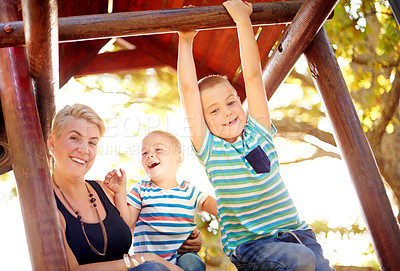 Buy stock photo Happy, park and mom with kids for playing, childhood and adventure outdoors on playground. Nature, family portrait and mother with children for bonding, learning skills and development on jungle gym