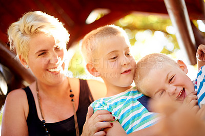 Buy stock photo Funny, mother and brothers in playground, smile and game with happiness, laughing and family. Single parent, mama and boys in park, nature and bonding together with fun, humor and countryside