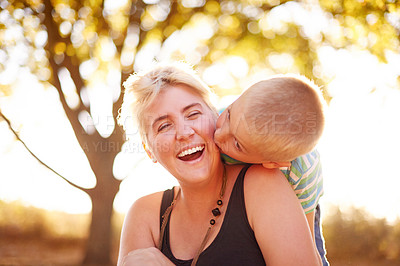 Buy stock photo Portrait, mother and son in park, love and bonding together with weekend break, care and relax. Nature, outdoor and family with parent, boy and mama with child, support and kiss with affection or joy
