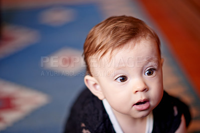 Buy stock photo Thinking, baby and kid in home for relax, imagine and dream with innocence in lounge. Cute child, young girl and adorable toddler with growth, healthy development and curious to explore living room