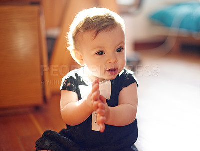 Buy stock photo Baby, girl and playing with hands on floor for childhood, youth or development at home. Little child, cute kid or young infant with innocent smile for activity, fun day or curious in nursery at house