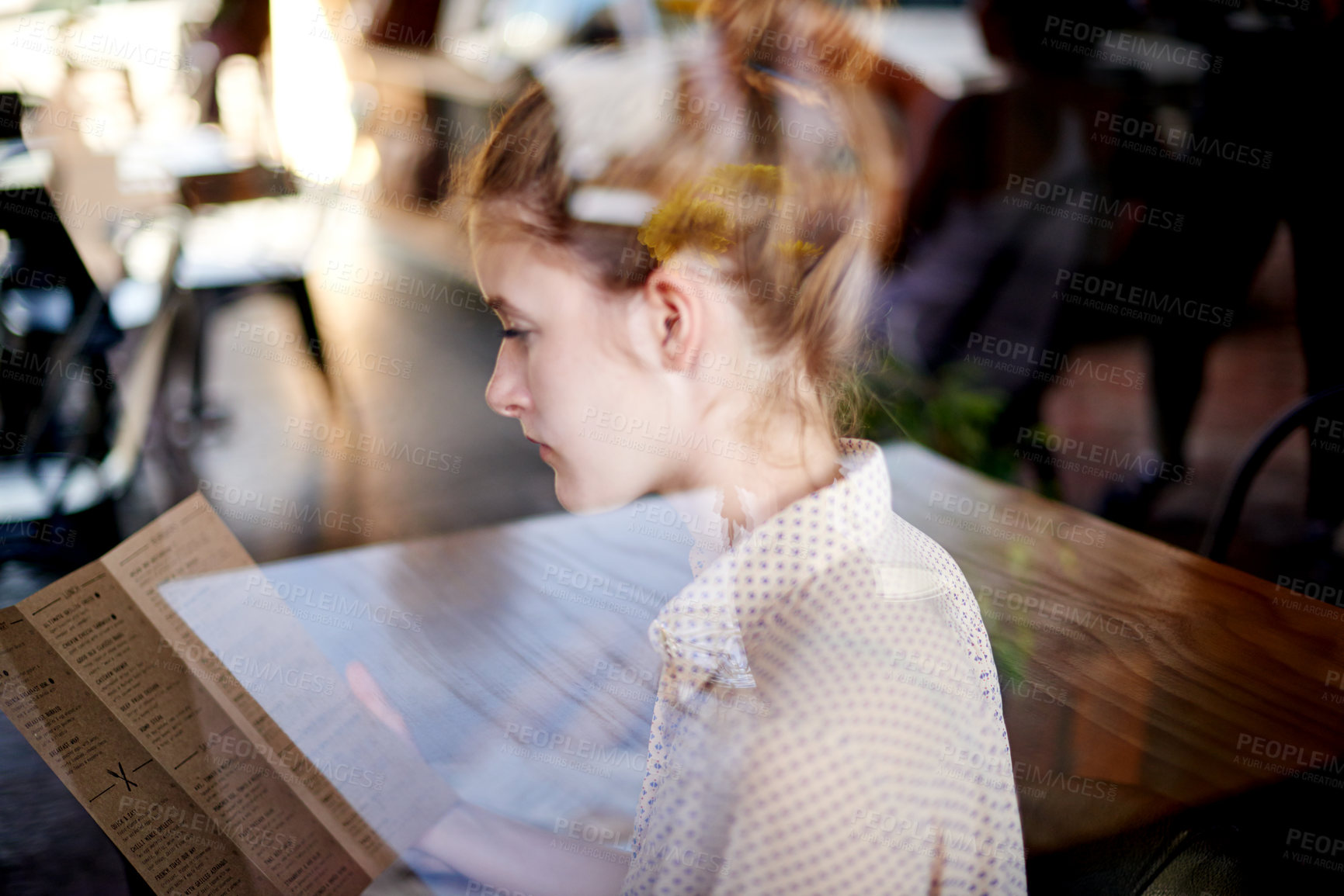 Buy stock photo Woman, window and reading menu at coffee shop, hospitality service and paper for food selection. Restaurant, customer search and female person for meal decision, worker and lunch break at bistro
