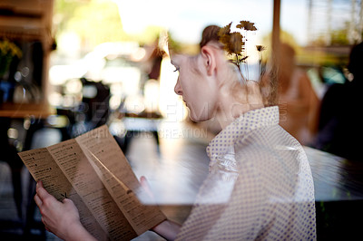 Buy stock photo Woman, window and reading menu at restaurant, hospitality service and paper for food selection. Coffee shop, customer search and female person for meal decision, worker and lunch break at bistro