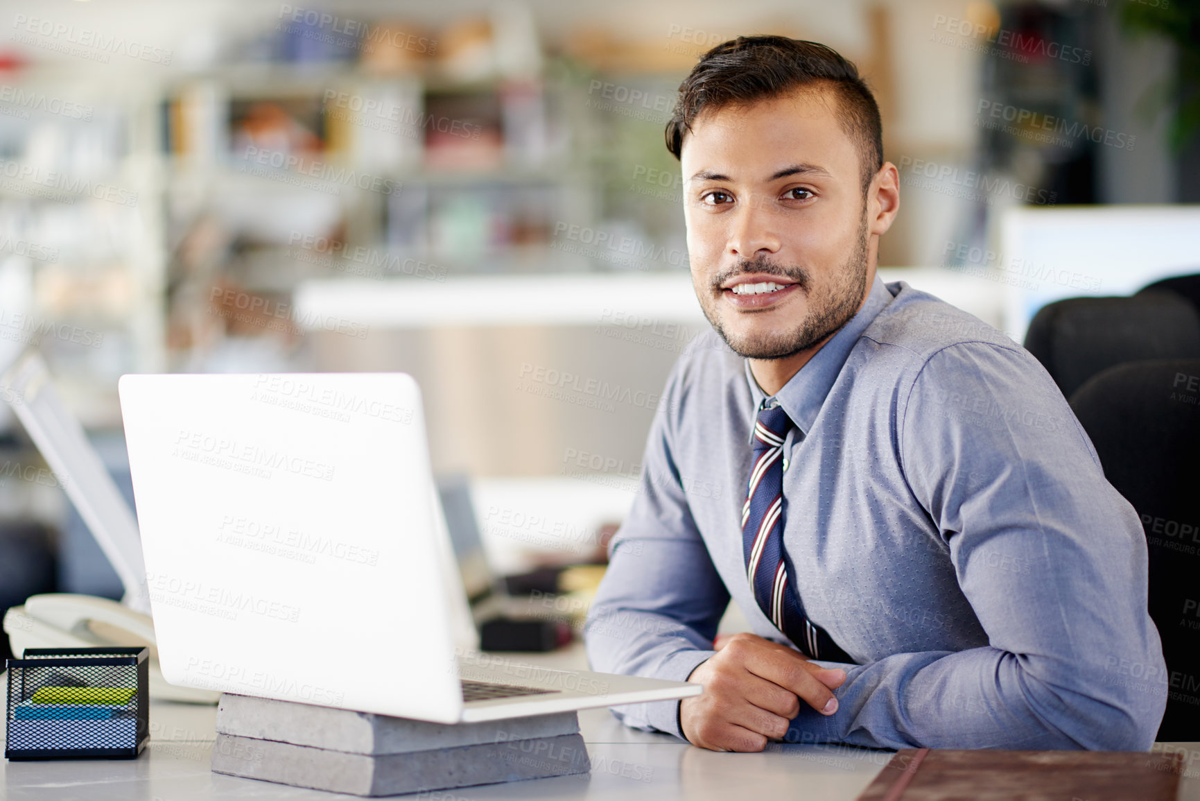 Buy stock photo Man, architect and happy with laptop at office, portrait and research for sustainable building material. Person, smile and computer for contact with supplier for eco friendly construction in Colombia