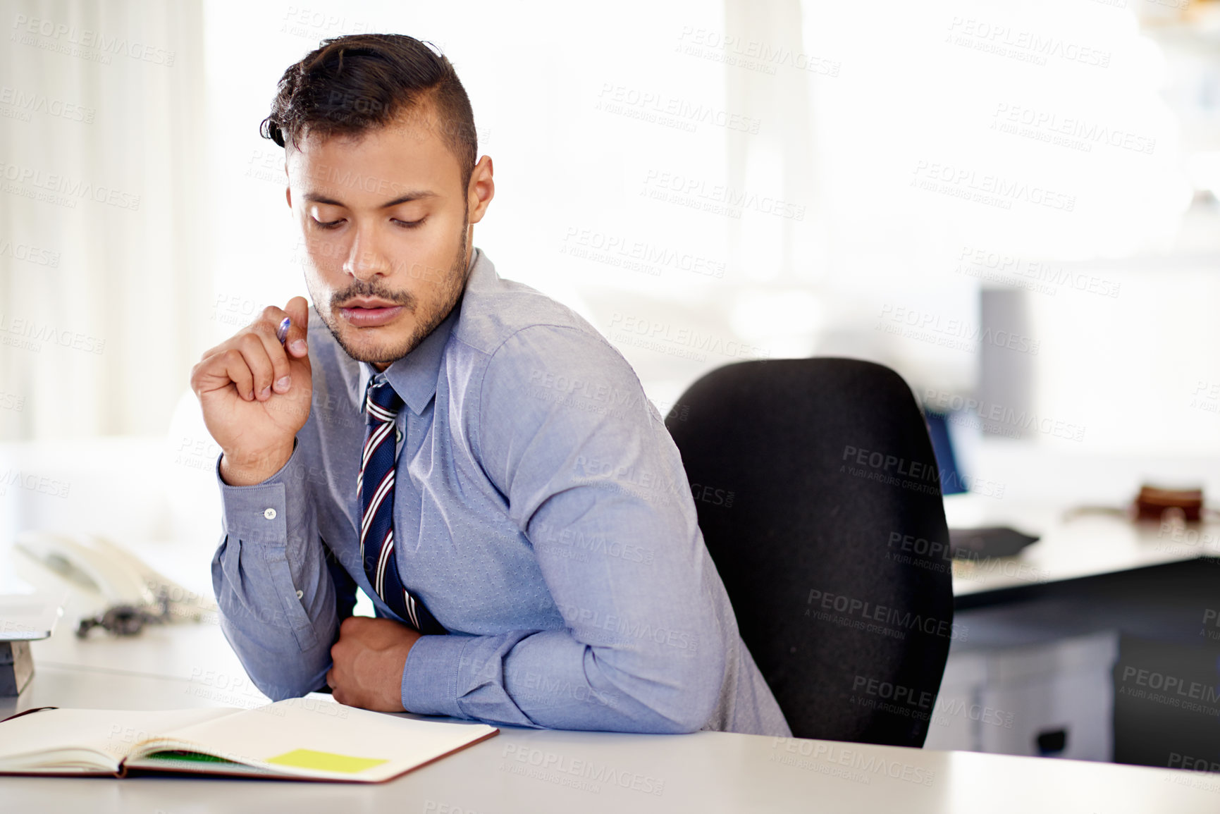 Buy stock photo Thinking, notebook and planning with business man in office for event designer schedule, client notes or budget. Gala agenda list, venue research and project management with person in agency for idea