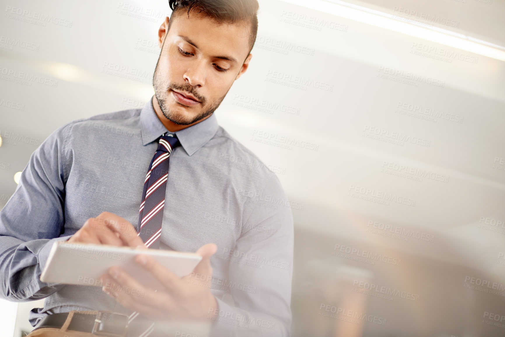 Buy stock photo Accountant, typing and man in office, tablet and online reading for financial report. Person, investor or employee in workplace, technology and digital app for economy stats, review income and email