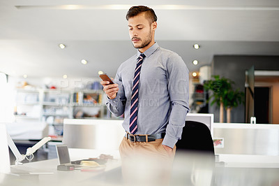 Buy stock photo Phone, investment and business man in office to check email, stock price and broker trading for profit returns. Mobile, serious worker and reading text on chat app, financial growth or scroll online