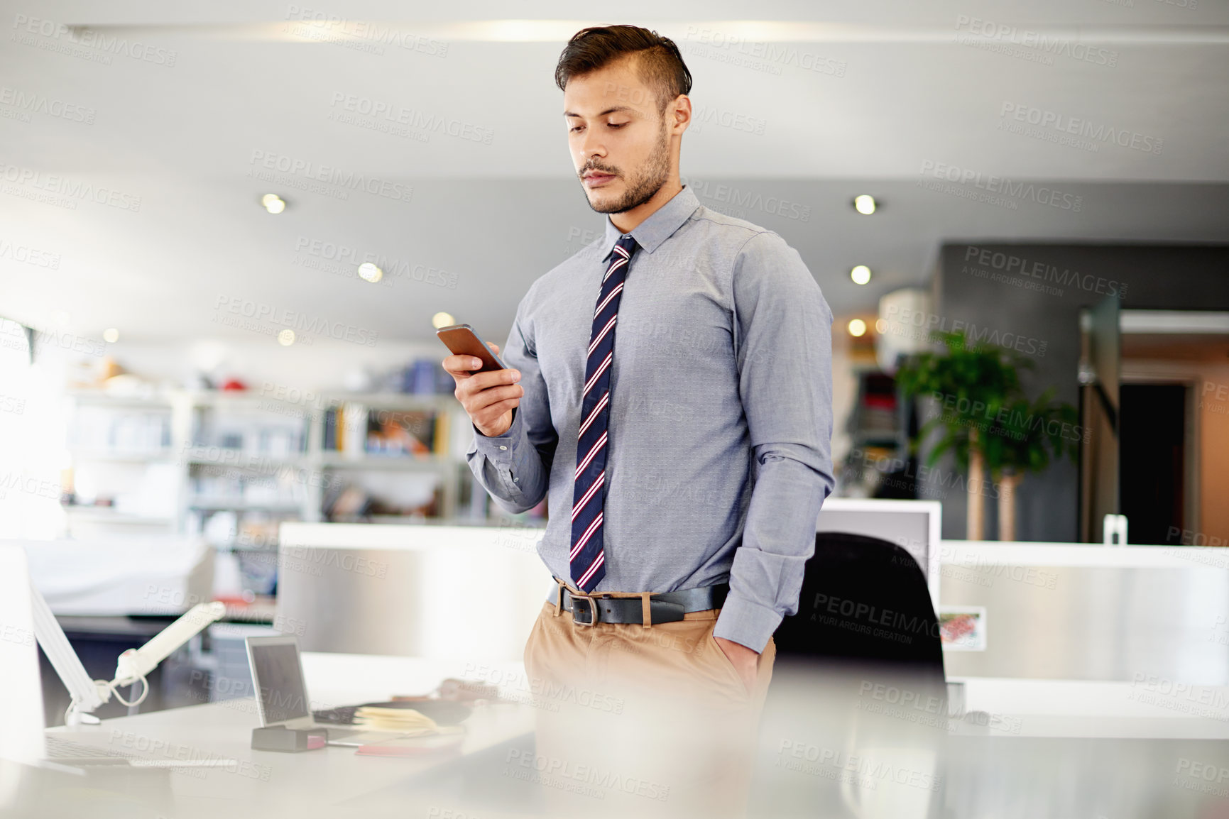 Buy stock photo Phone, investment and business man in office to check email, stock price and broker trading for profit returns. Mobile, serious worker and reading text on chat app, financial growth or scroll online