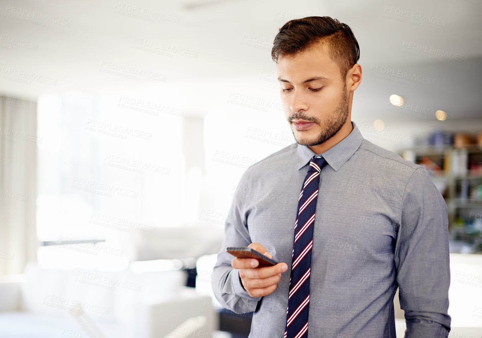 Buy stock photo Phone, office and business man reading email, stock price and broker trading for investment returns. Mobile, serious worker and check message on chat app for finance, profit growth and scroll online