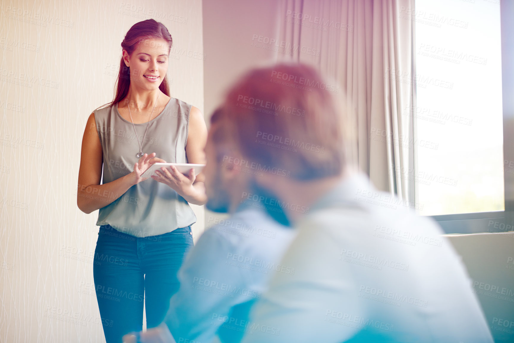 Buy stock photo Business woman, meeting or presentation with tablet for staff training, collaboration or workshop at office. Female person, group or talking with technology to audience for team delegation at seminar