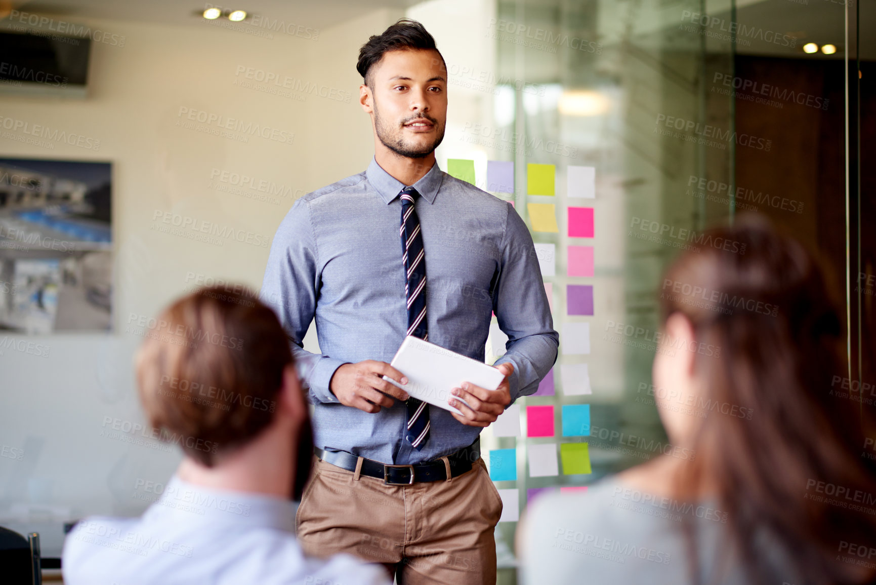 Buy stock photo Architecture, speaker and tablet with man in meeting for client proposal, progress update and planning. Construction project, presentation timeline and engineering firm with business people in office