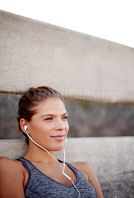 Buy stock photo Break, listening and woman with earphones, fitness and music for exercise, training or resting outdoor. Wellness, streaming and audio for person in morning, workout or athlete with routine on weekend
