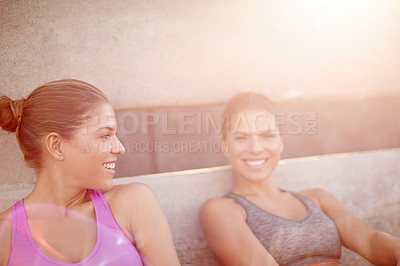 Buy stock photo Fitness, happy and women with resting outdoor for cardio challenge, running recovery and workout break. Space, flare and twin sisters with relaxing on bridge for marathon competition and overworked