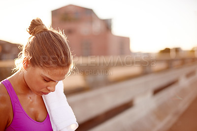 Buy stock photo Healthy, break and woman with towel, exercise and wellness for building muscle, training and outdoor. Fitness, fatigue and rest for person with sportswear, workout and athlete with routine on weekend