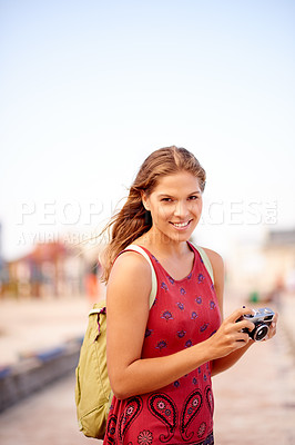 Buy stock photo Outdoor, woman and portrait with camera for photography, holiday destination and memory in city. Vacation, happy person and photographer with digital equipment for picture, sightseeing and shooting