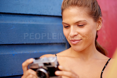 Buy stock photo Confidence, camera and beach with woman, vacation and memory with travel influencer, journey and break. Explore, person and girl with photography, summer holiday and capture with tourism and calm