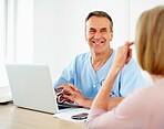 Female patient in consultation with a male doctor at clinic