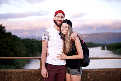 Buy stock photo Portrait, happy couple and hiking by lake for travel, adventure or journey on holiday for date by mountain. Man, woman and trekking together by river outdoor for tourism, vacation and hug in Portugal