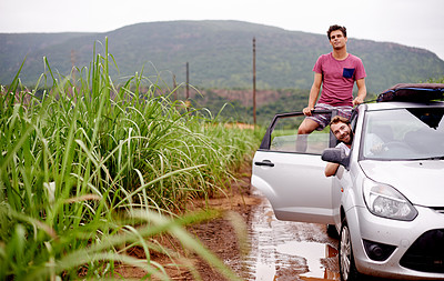 Buy stock photo Friends, car and portrait in nature for road trip, adventure and travel break in countryside. Men, vehicle and drive on farmland for journey, vacation trip and outdoor for sightseeing on dirt road
