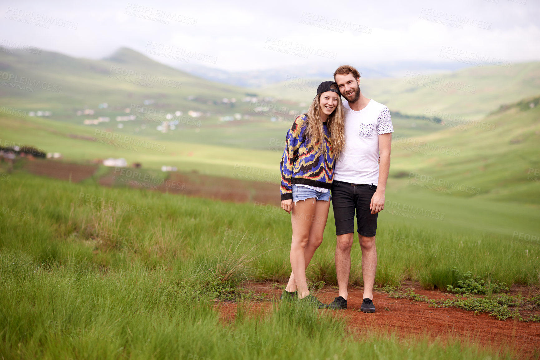Buy stock photo Couple, travel and happy with portrait in countryside for holiday weekend, vacation adventure and exploration. Space, nature scenery and people together on field for romantic trip, love and support