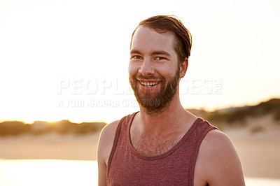Buy stock photo Travel, happy and man in portrait by beach for weekend getaway, holiday adventure or relaxing trip. Space, person and smile at seaside for fresh air, break or tourist on tropical island for exploring