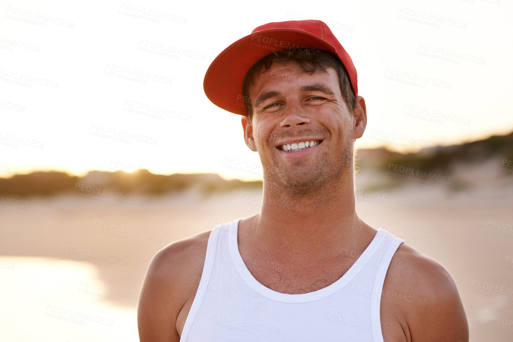 Buy stock photo Man, happy and portrait on beach for travel, freedom and stress free on summer vacation. Person, sunset and relax at ocean for holiday trip, weekend getaway and outdoor in Australia with sky space