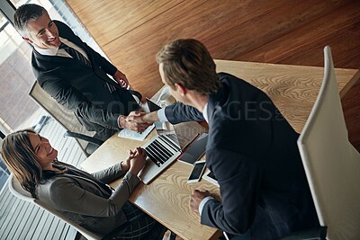 Buy stock photo Business, people and handshake in office for deal, welcome and B2B collaboration at tech. Above, professional team and hand gesture in workplace for introduction, agreement and partnership meeting