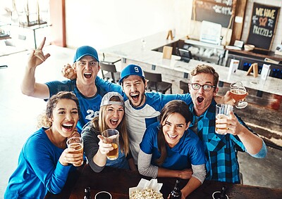 Buy stock photo Alcohol, sports and fans in pub for winning game with goal for celebration in support together. Excited, top view and group of friends drink beer and watch broadcast television of team match in bar.