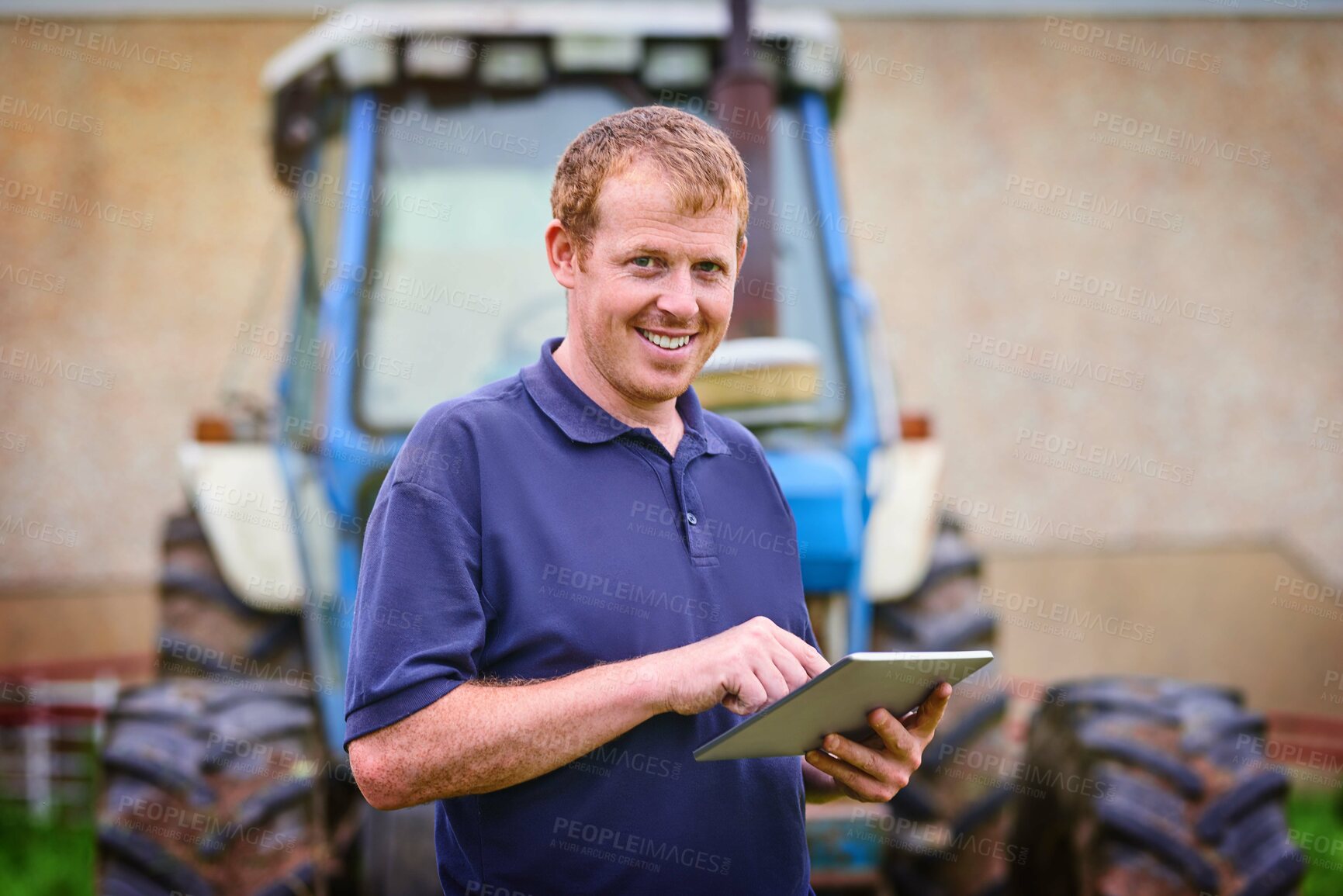 Buy stock photo Farming, portrait and man with tablet by tractor for production, schedule and research on weather. Happy, farmer and male person with technology for agriculture, information and update on industry