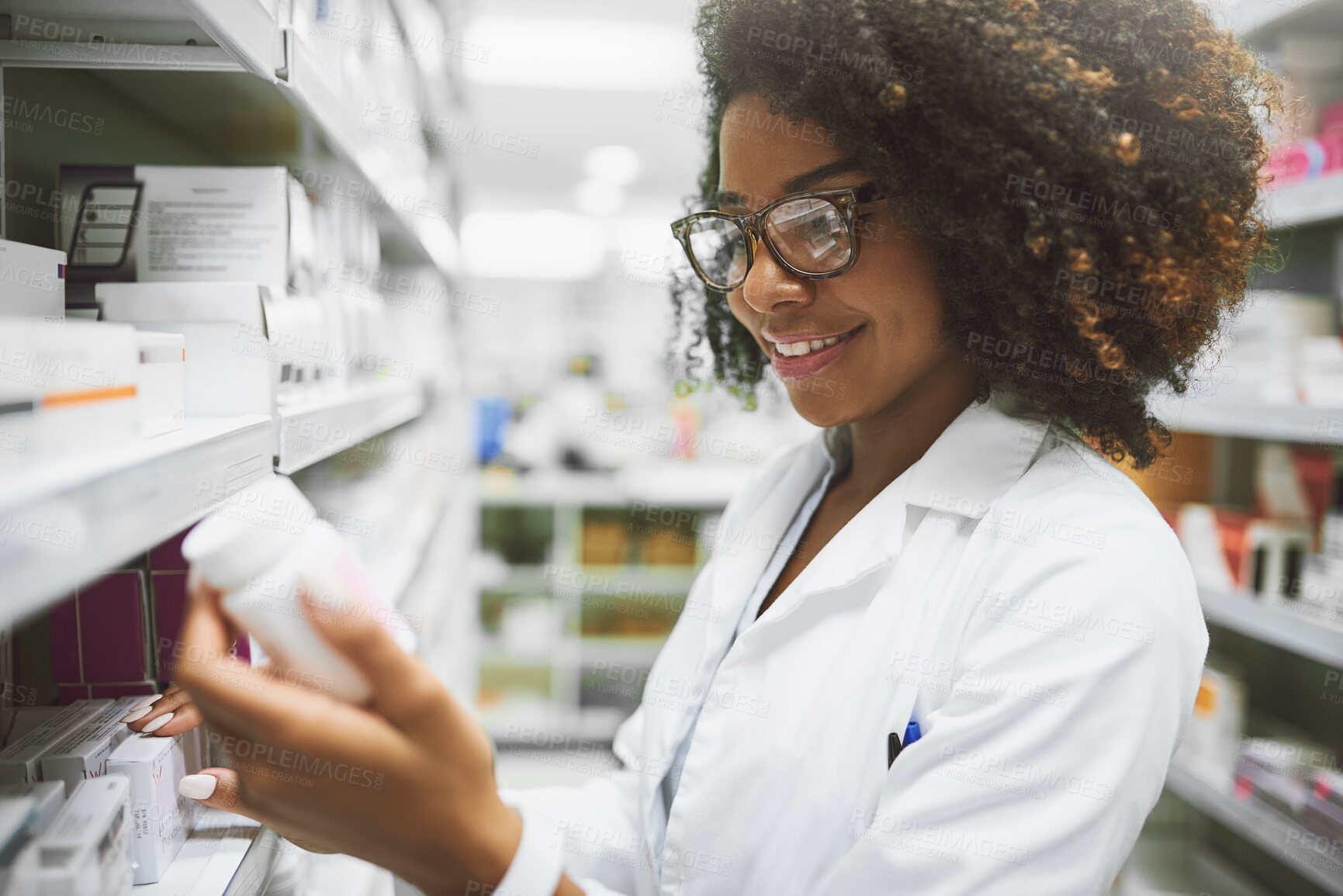 Buy stock photo Medicine, check and happy woman at a pharmacy for inventory, stock and prescription drug search. Industry, label or African pharmacist with glasses at store for pills, inspection or quality assurance
