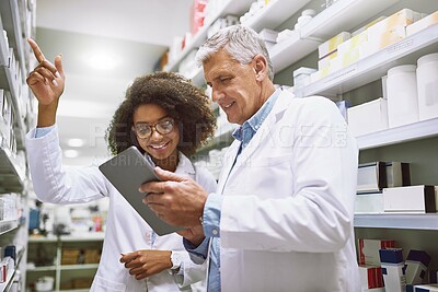 Buy stock photo Tablet, conversation and pharmacists with medication in chemist for inventory or stock checking. Healthcare, internship and mentor with pharmacy student by medicine for research on digital technology