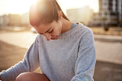 Buy stock photo Woman, break and tired in city for exercise, fitness and reflection at sunset, outdoor and thinking on road. Person, runner and rest with breathing, burnout and workout on urban sidewalk in Spain