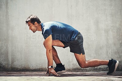 Buy stock photo Running, start and man with outdoor fitness for exercise, strong body and muscle development. Begin position, male runner and cardio with ready to go, sprint speed and training for sports competition