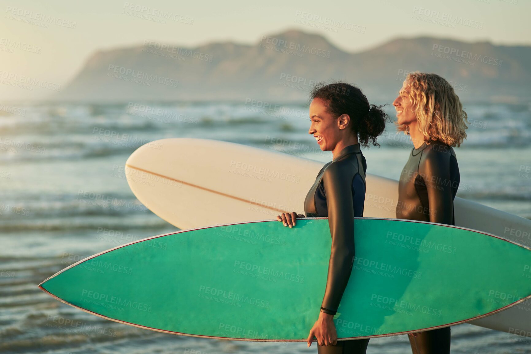 Buy stock photo Freedom, sunset and fitness couple with surfboard at beach for training, workout or bonding with morning cardio adventure. Love, view and friends surfing at the ocean for travel, fun or sports