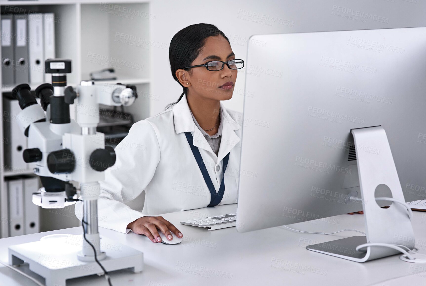 Buy stock photo Woman, scientist and research in laboratory with computer, review or thinking for solution at pharmaceutical company. Person, pc and innovation for medicine, drugs or reading medical journal with web