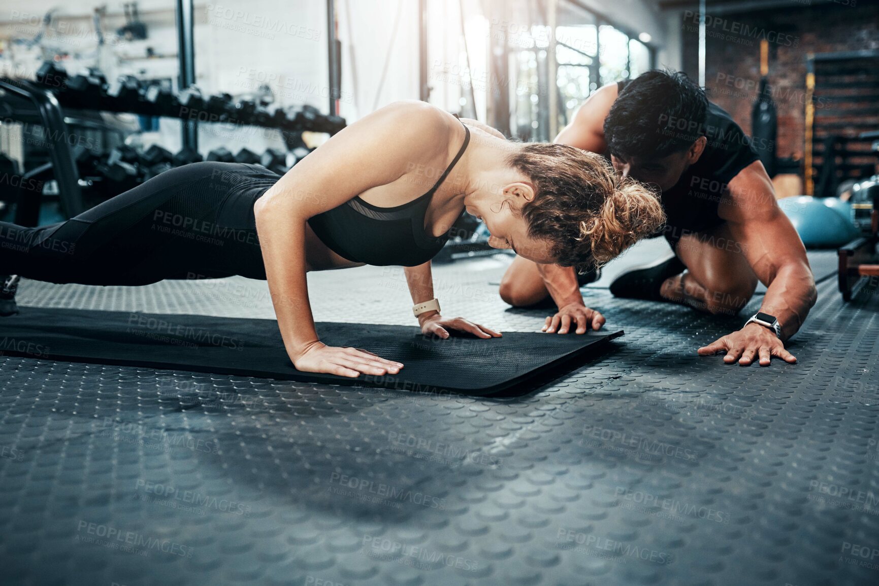 Buy stock photo Push ups, man and woman in gym, personal trainer and mat for exercise, fitness and advice for health. Instructor, talking and wellness with workout and performance of training and warm up in club
