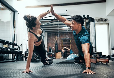 Buy stock photo Exercise, personal trainer and woman high five for wellness, fitness and training on gym floor. Health, warm up and friends with workout, coach and body performance routine for core muscle goals