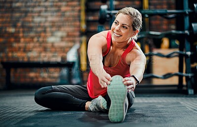 Buy stock photo Think, stretching leg and woman in gym for fitness, training and exercise for wellness with balance. Health club, endurance and female person with warm up, preparation and getting ready for sports