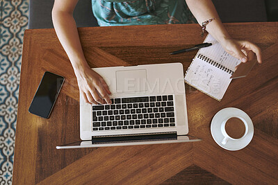 Buy stock photo Above, person and hands with laptop for credit card, digital banking and transaction for payment in cafe. Coffee store, freelancer and tech with debit for online shopping, information and ecommerce