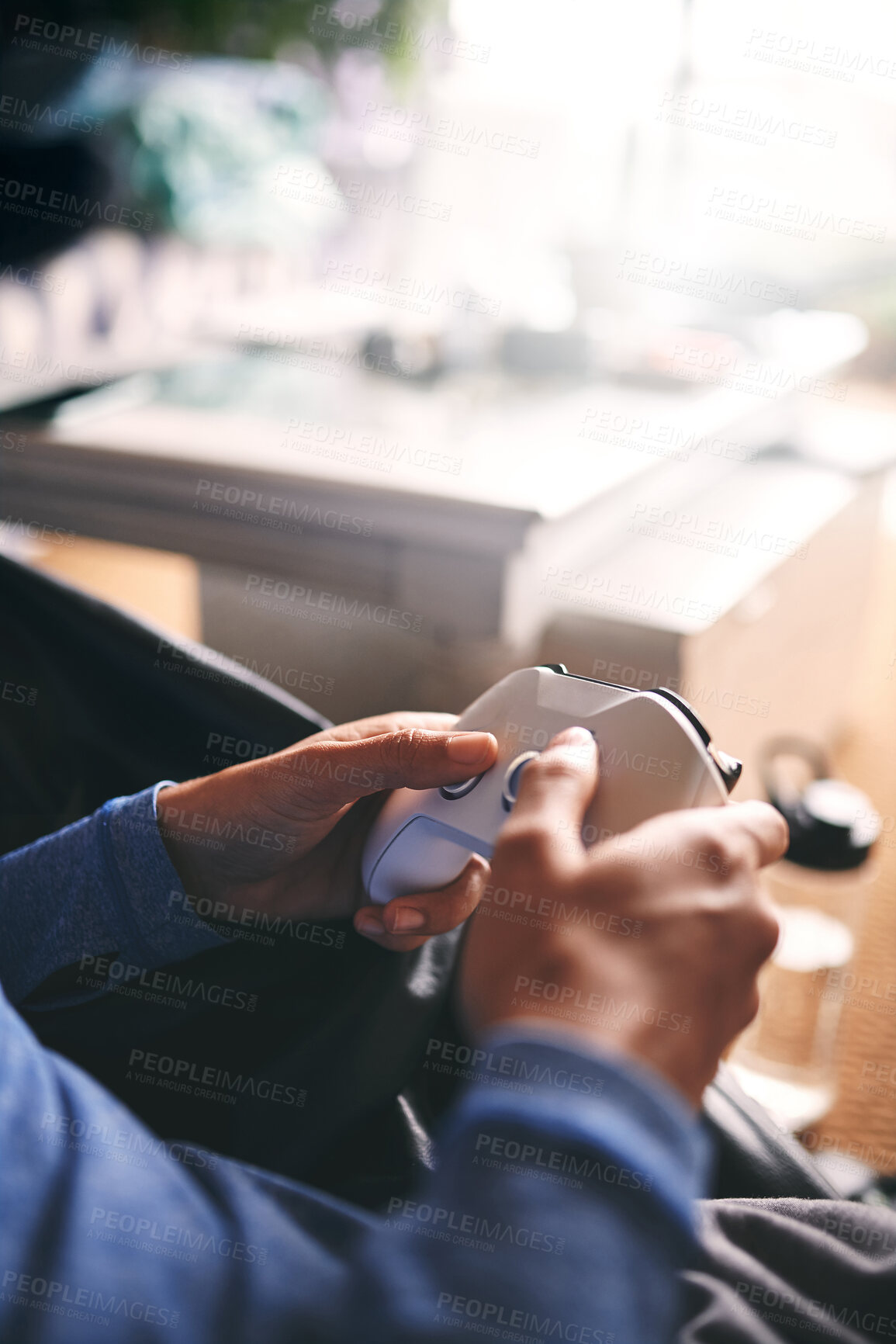 Buy stock photo Person, hands and playing video game on sofa for weekend break, online challenge and virtual subscription. Gamer, joystick and live streaming contest in home for entertainment, hobby and level up