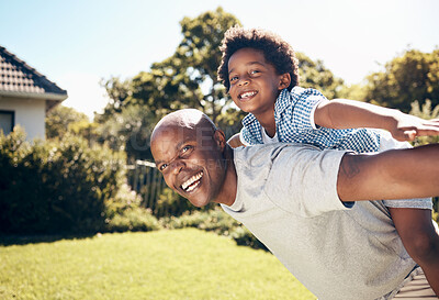 Buy stock photo Piggy back, backyard and dad with child for playing, fun and bonding together on weekend. Family, happy and African father with son on grass for playful relationship, childhood and relax outdoors