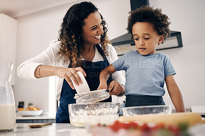 Buy stock photo Woman, child and support in kitchen for baking, teaching and relationship development in home. Mother, kid and cake ingredients at counter for bonding, family recipe and fun activity with learning