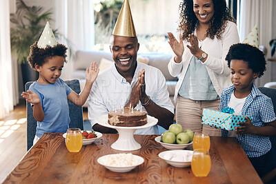 Buy stock photo Cake, clapping hands and family at birthday in home for party, event or gathering together for bonding. Love, happy and kids with parents for celebration with hats, gifts and dessert for tradition.