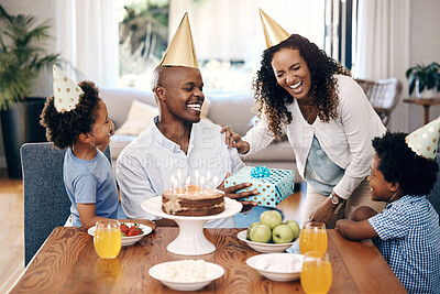 Buy stock photo Cake, laugh and family at birthday in home for party, event or gathering together for bonding. Love, connection and children with parents for celebration with hats, gifts and dessert for tradition.